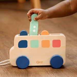 Kiwi Co Wooden Peekaboo Pull Bus with passengers